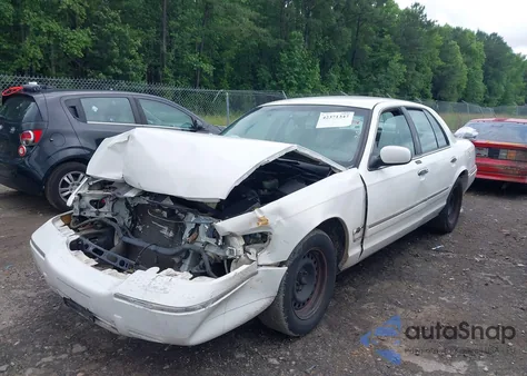2000 Mercury Grand Marquis Gs z USA, uszkodzony, nr VIN 2MEFM74W0YX670777